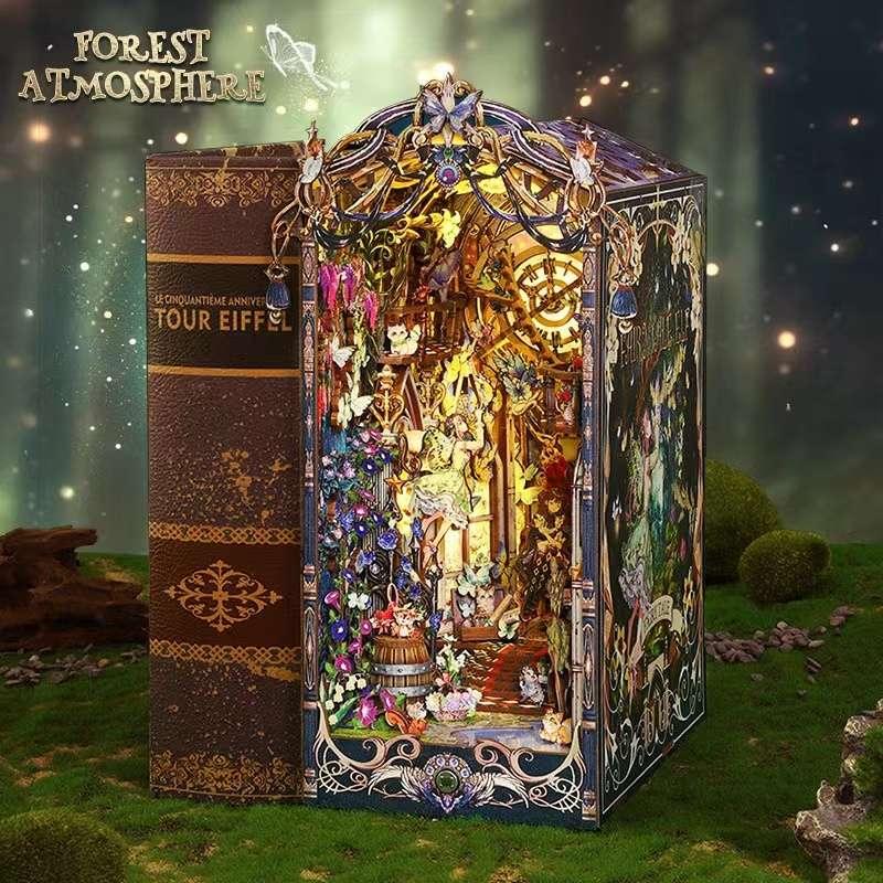 Fairy Tale Elf DIY Book Nook Kit, a miniature fairy tale in a forest, body sensor light, and dust cover. Perfect for shelf decor or as a magical gift.