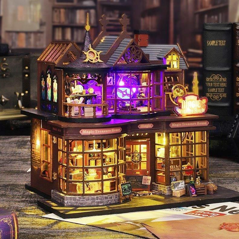 Magic Treasure House DIY Dollhouse Kit featuring a detailed miniature fantasy scene with intricate furniture, colorful decorations, and hidden treasures; designed for crafting enthusiasts to assemble and display as a magical, whimsical addition to any space.